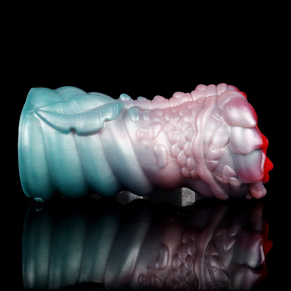 Pink-and-teal dragon fantasy masturbator with scaly texture and red side details