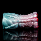 Teal dragon fantasy masturbator with pink scaly ridges and curled red tip