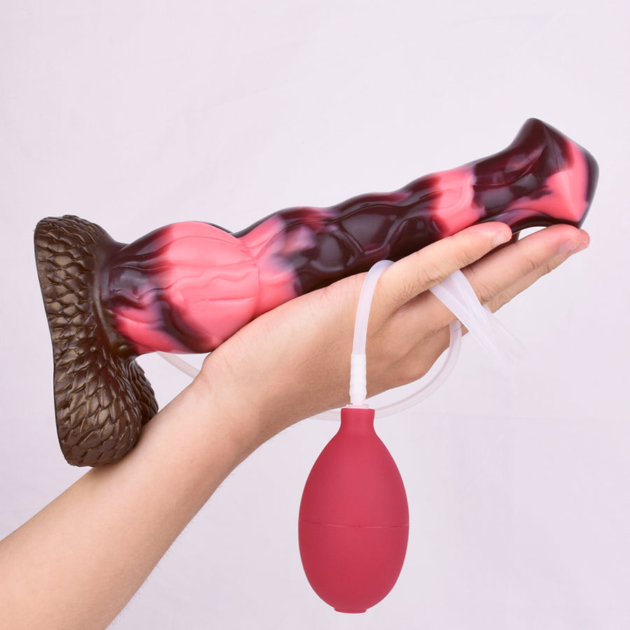 Horse-shaped sex toy with marbled red surface, textured base, hand holding a white strap