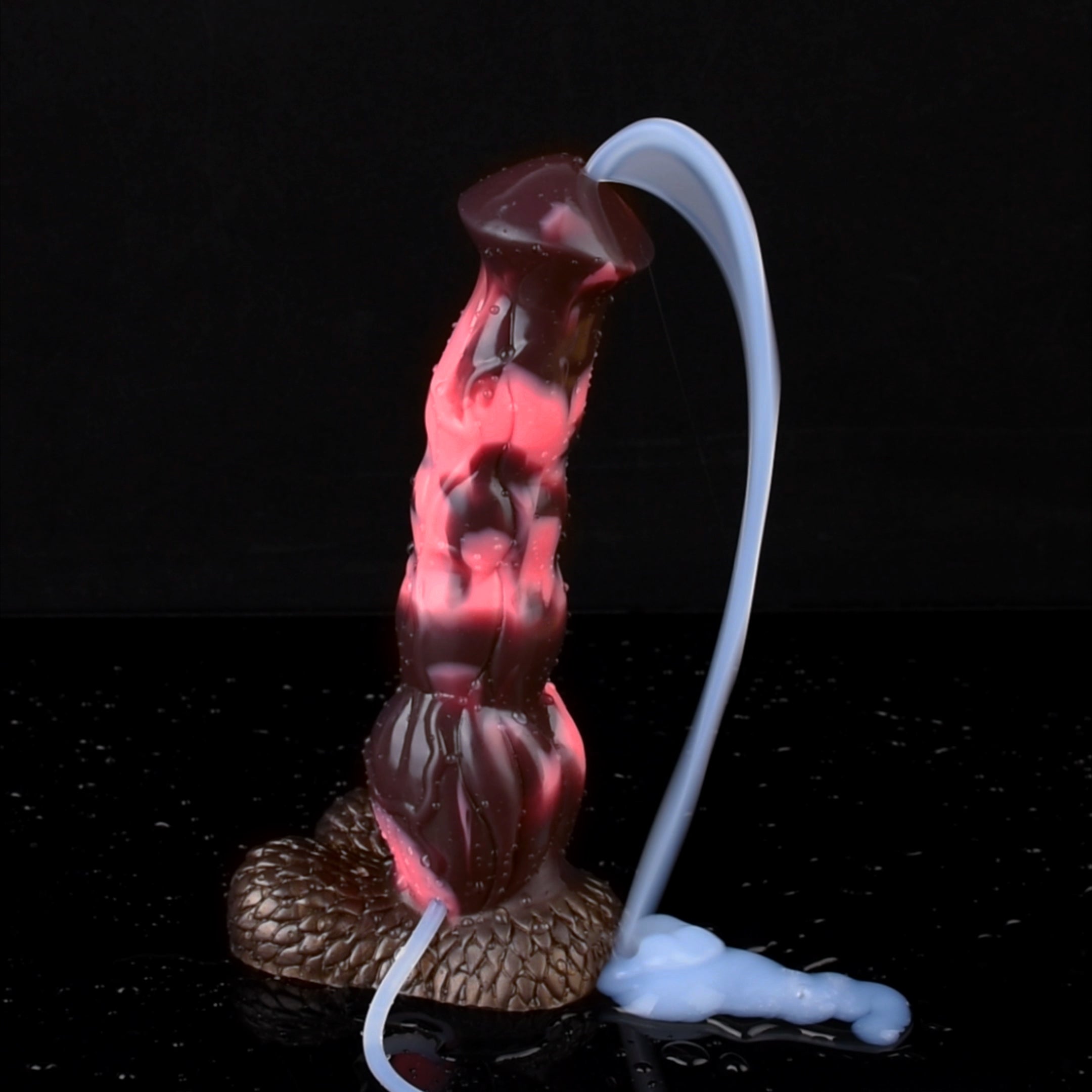 Horse-shaped adult toy with attached tube and textured base, dark pink/black