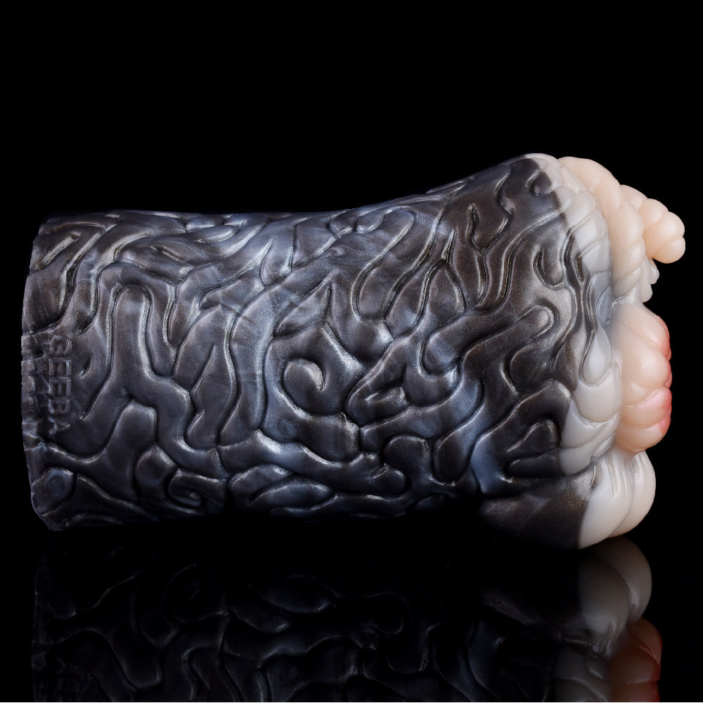 Realistic animal fleshlight, top view of dark gray ridged texture