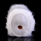 Front view of white furry dual-hole opening with small brown center