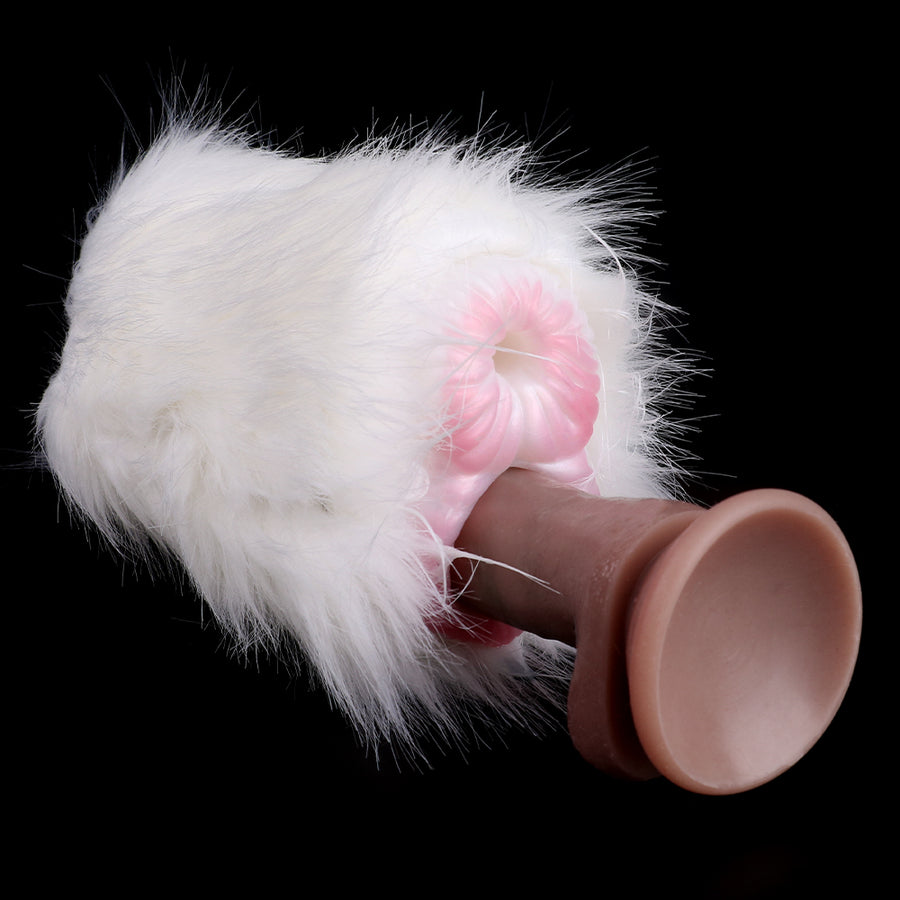 White plush dual-hole sex toy with brown silicone end and pink inner opening