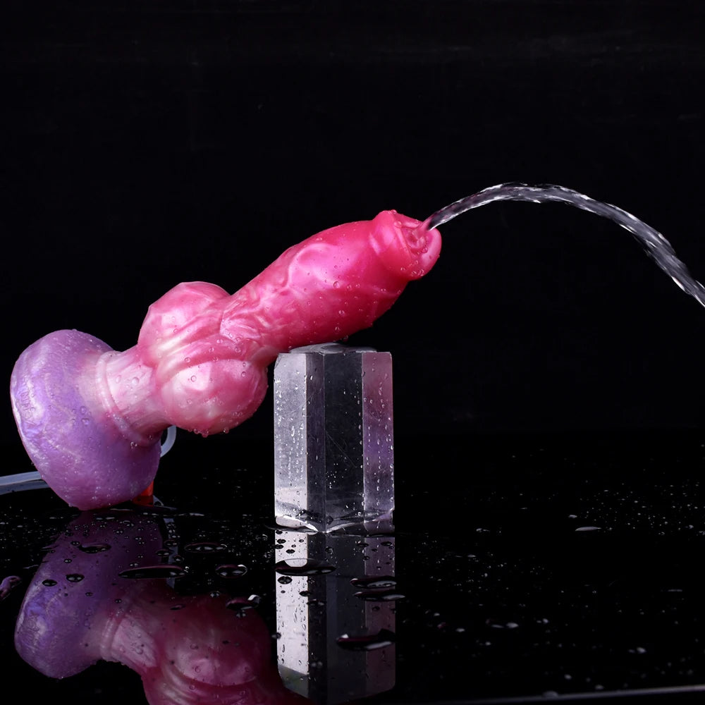 Pink dog-shaped squirting dildo with clear water stream and purple base