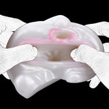 Snow Hare dual-hole masturbator with vibration, open front with pink inner openings