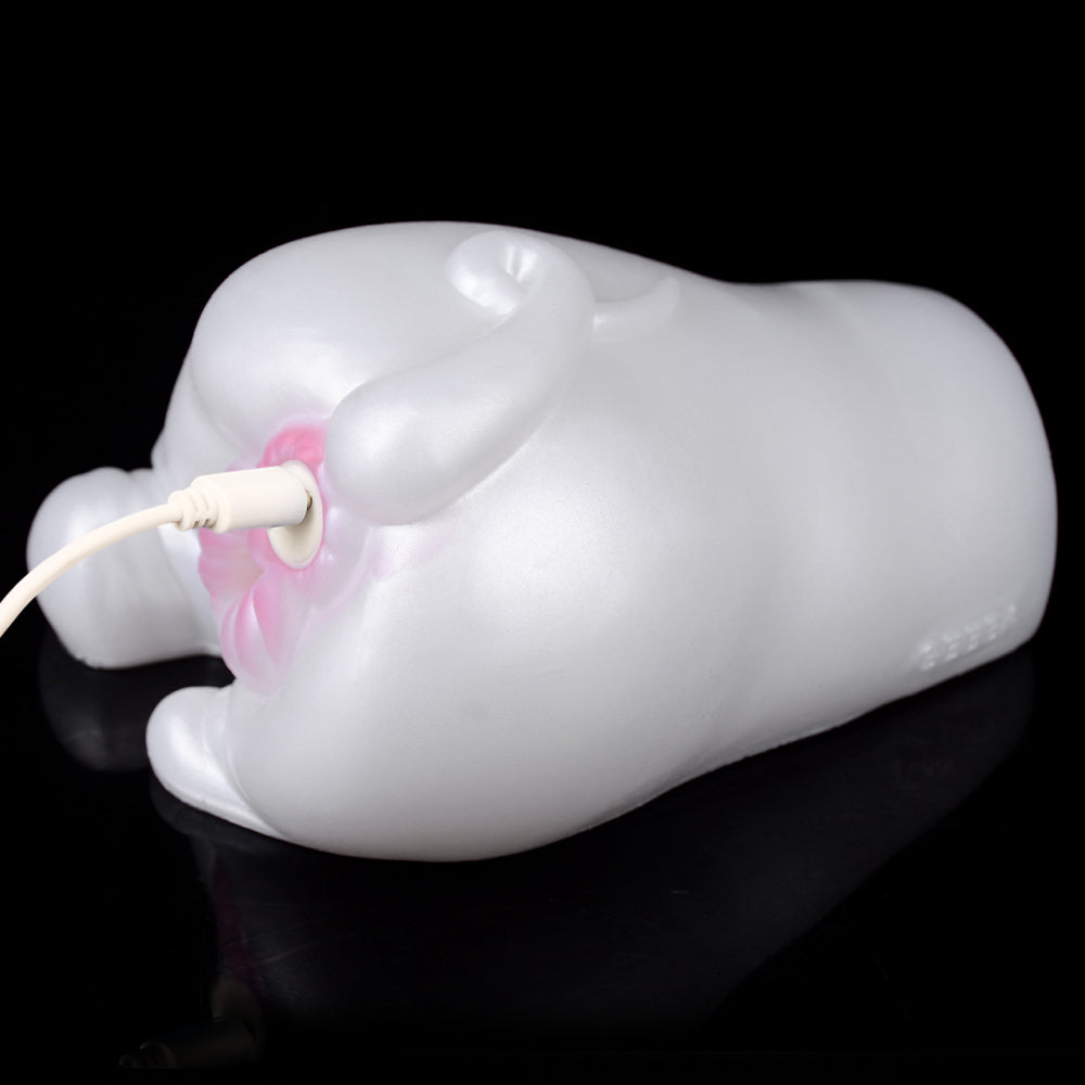 White rabbit-style dual-hole toy with pink interior and side nozzle