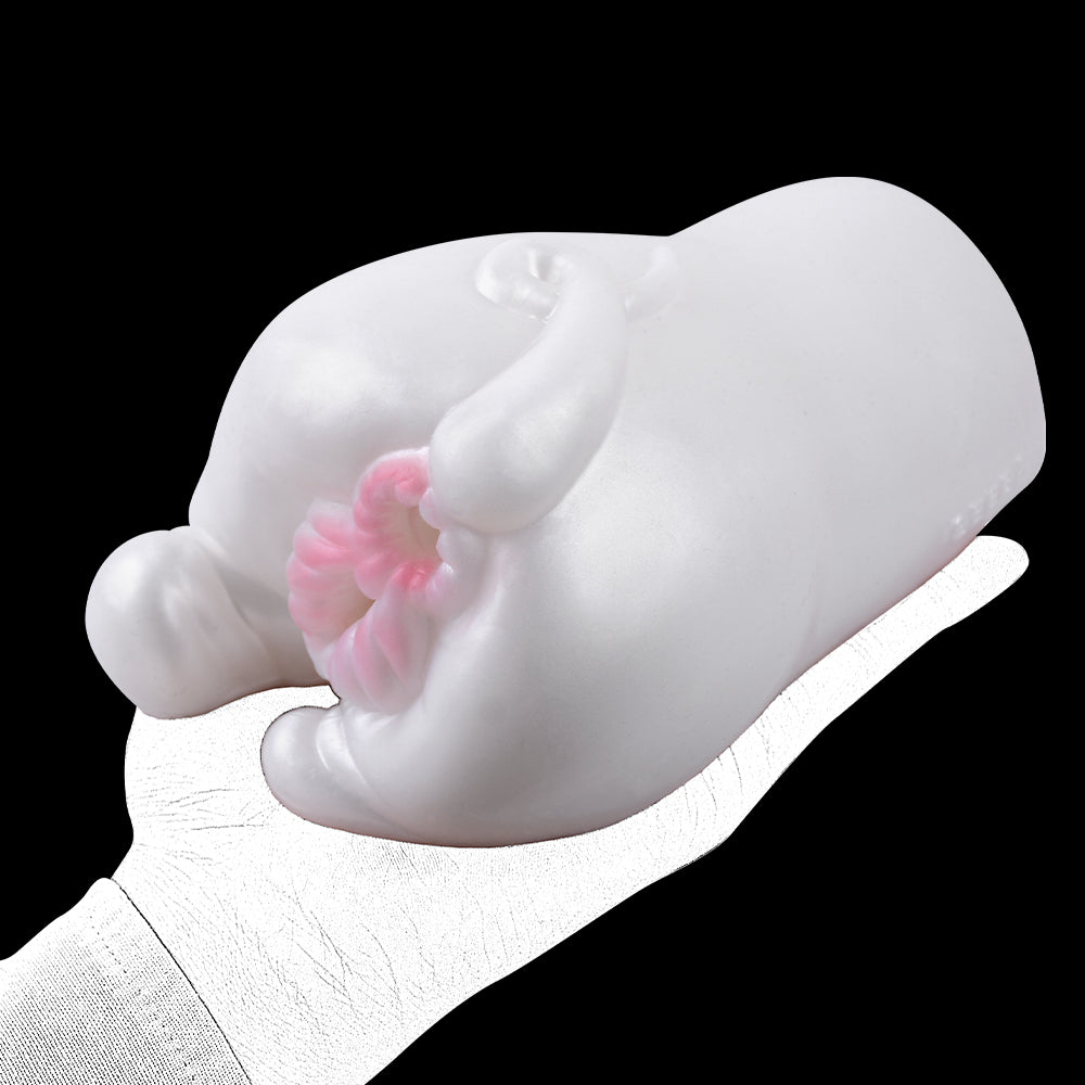 Snow Hare dual-hole masturbator, angled view with pink dual opening on white rabbit design