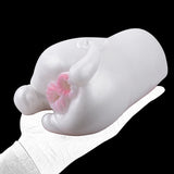 Snow Hare dual-hole masturbator, angled view with pink dual opening on white rabbit design