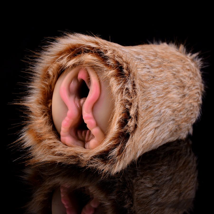 Furry dual-hole stroker sleeve showing pink inner openings and brown fur texture