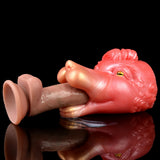 Pink/red creature fleshlite with open end and textured grip area; side view