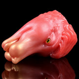 Pink creature-shaped Fleshlight with visible facial eye detail