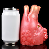 DirtyToyz pink/red creature fleshlite next to white container; side/back view