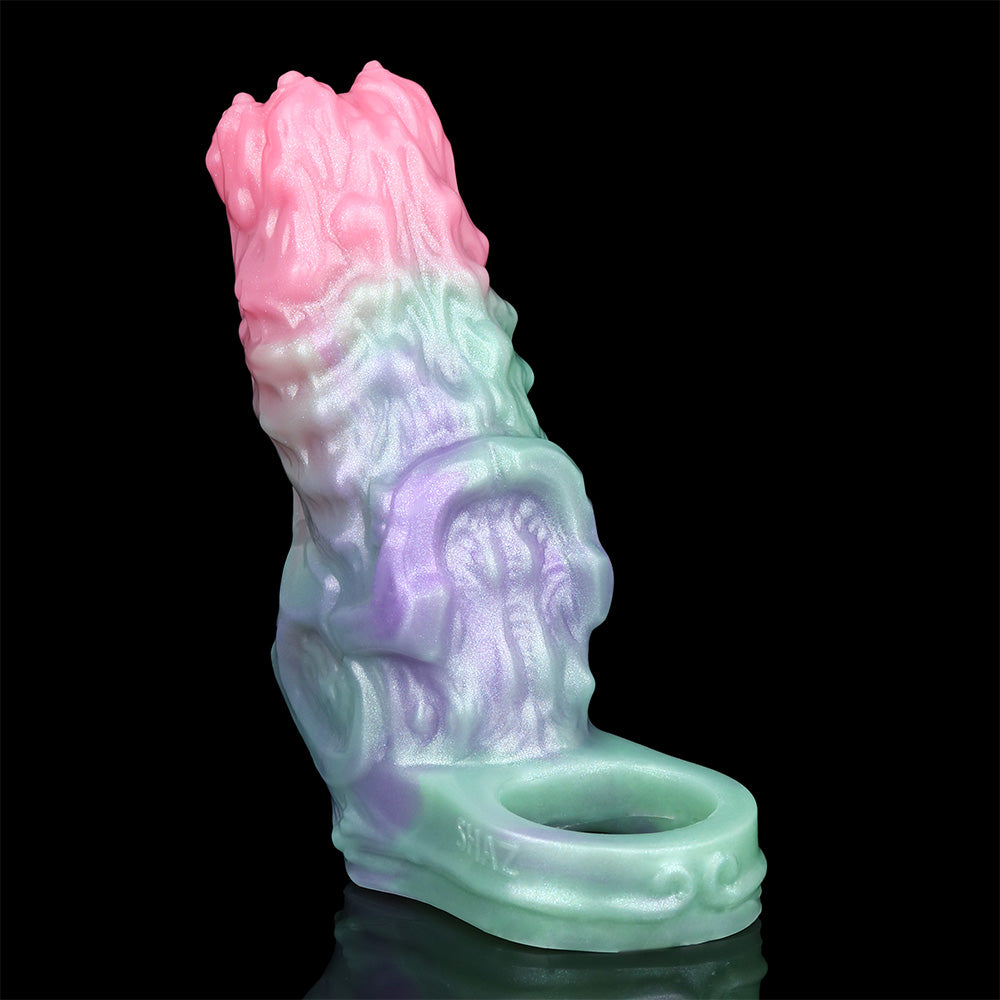 Cock sleeve extender side profile; mint base with pink top and purple mid textured details