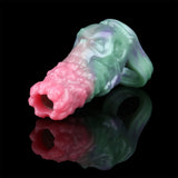 Cock sleeve extender with open ring end; iridescent turquoise, purple and pink textured design