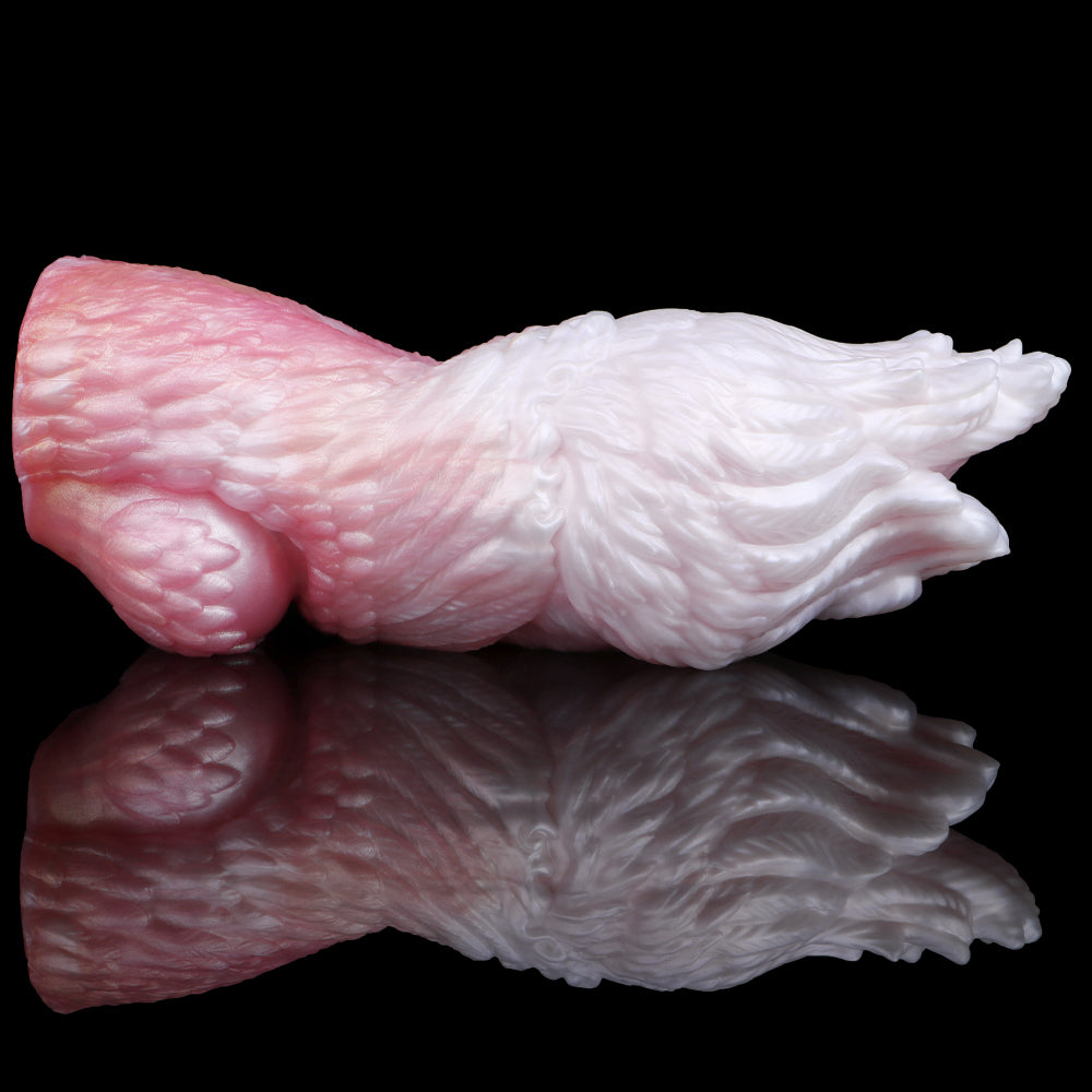 Side view of squid-shaped fleshlight, pink and white, ribbed tentacle texture