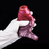 Back view of magenta dragon knot sleeve extender, dragon scale pattern base ring
