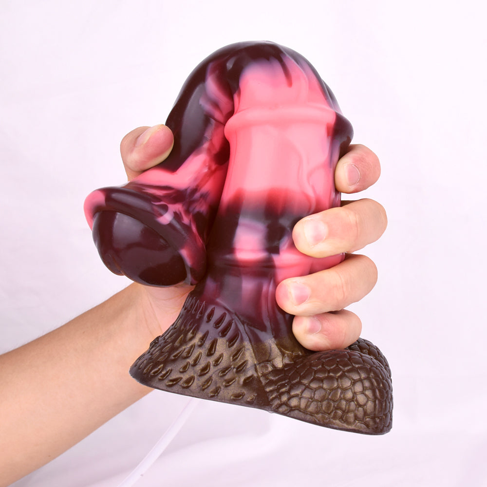Horse-cock toy held in hands, brown textured base and glossy pink translucent body