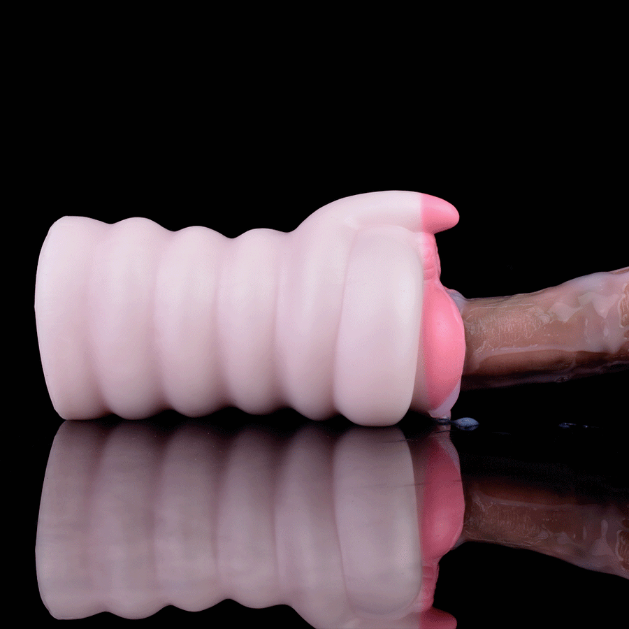 Pig-themed masturbator with ribbed body and open pink end, light flesh tone