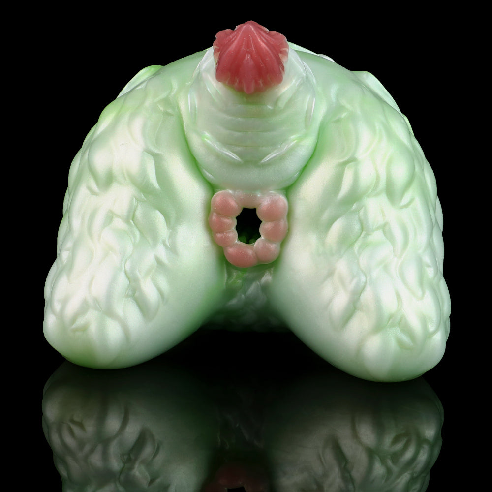 Green silicone butt plug with pink insert tip, contoured ridged texture, front view.