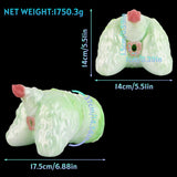 Green silicone butt plug set, pink insert tip, side and angled views.