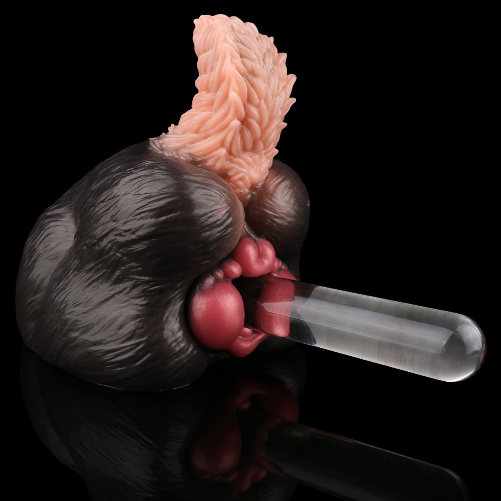 Dog-themed tailless sex toy: black body, pale pink textured insert, clear handle