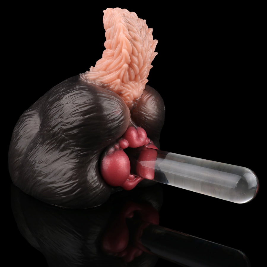 Dog-shaped adult novelty sex toy with light pink insert and clear handle