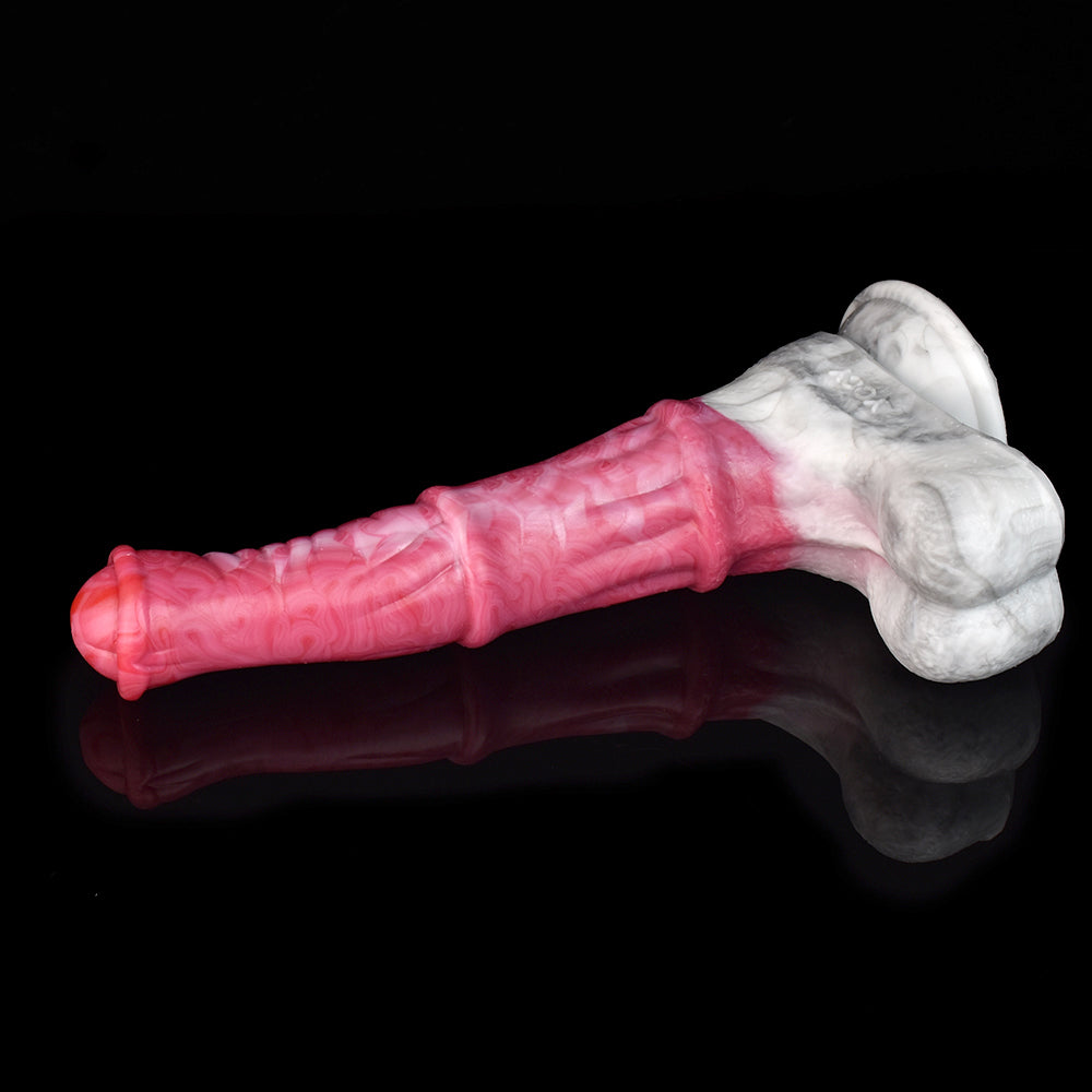 Pink vibrating dildo with marbled white base, angled side view