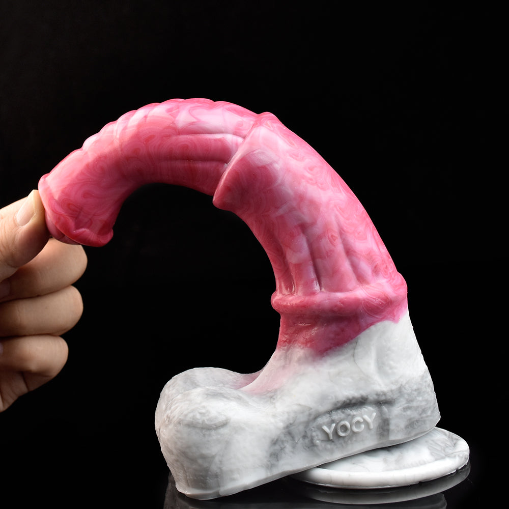 Vibrating horse dildo, pink-and-white with minotaur design, hand holding base.