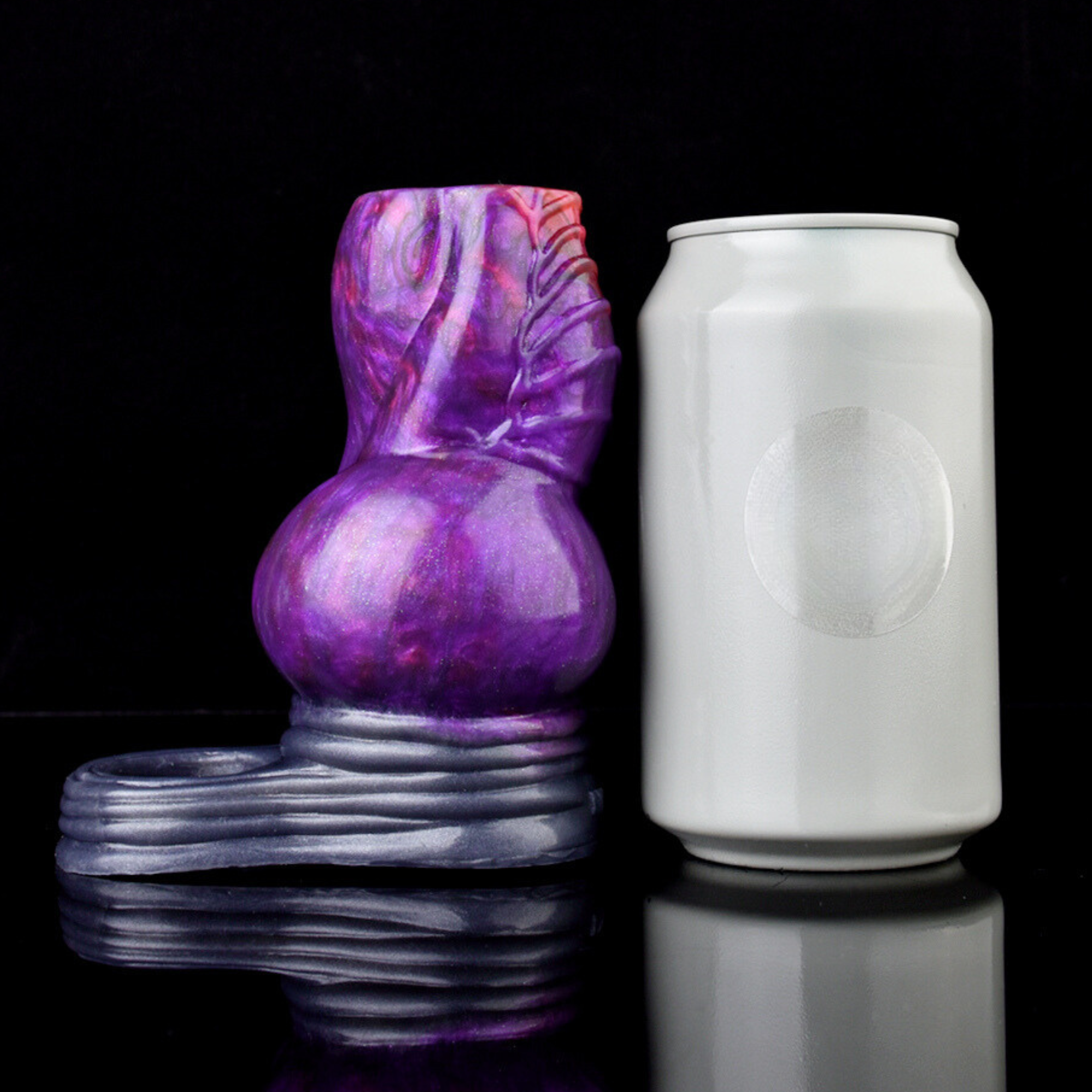Purple glossy sleeve extender with ribbed silver base; rounded open end