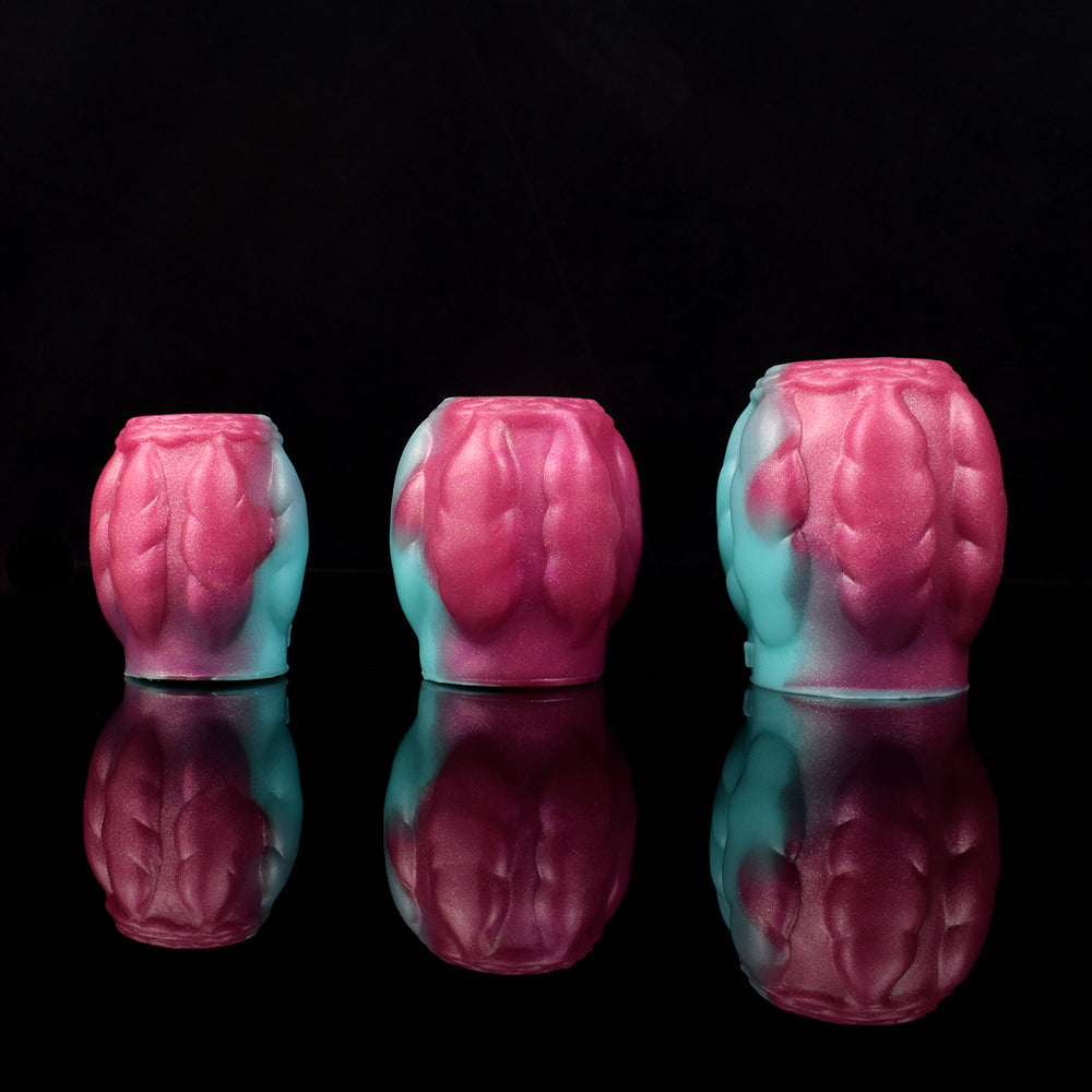 Dragon knot sheath sleeve extender set, teal and pink molded texture, front view