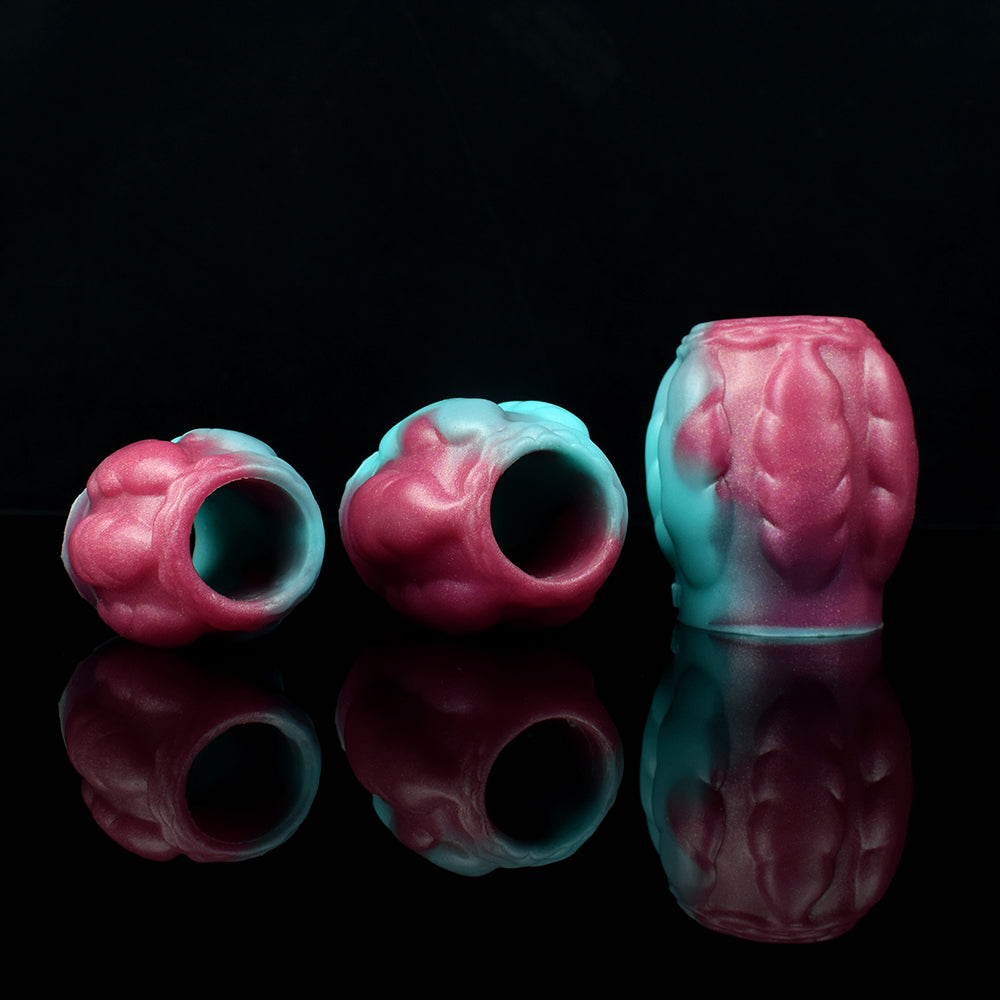 Teal and pink dragon knot sheath sleeve extender open ends, reflected side-by-side