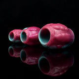 Teal and pink dragon knot sheath sleeve extender open ends close-up, three pieces