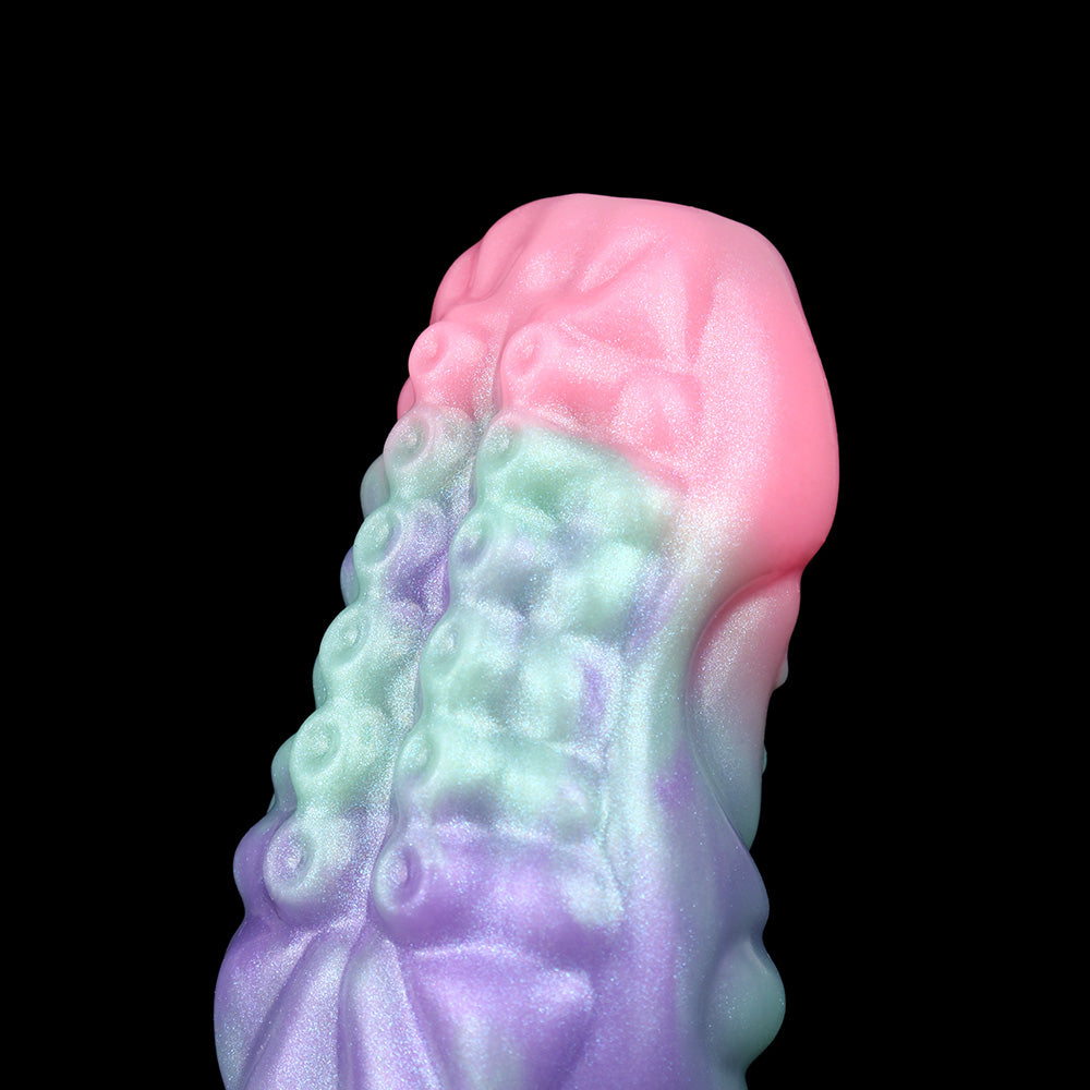 Octopus cock sleeve sheath close-up; pink tentacle cap over green and purple body