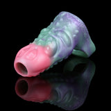 Octopus cock sleeve sheath end view; open pink ring and iridescent purple-green surface