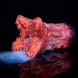 Red tentacruel-style stroker with textured octopus tentacles and ridged surface