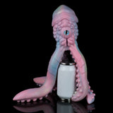 Pastel octopus figurine upright with blue-green eye and side tentacles