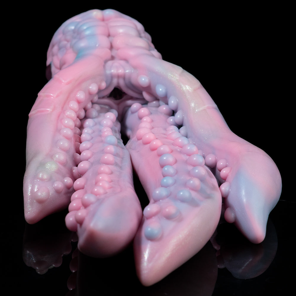 Pastel octopus figurine close-up of head and tentacles with textured bumps