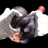 Adult novelty toy close-up with dark gray body, red top ends, and pink detail
