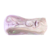 Masturbator sleeve interior with raised bead cluster and ribbed passage