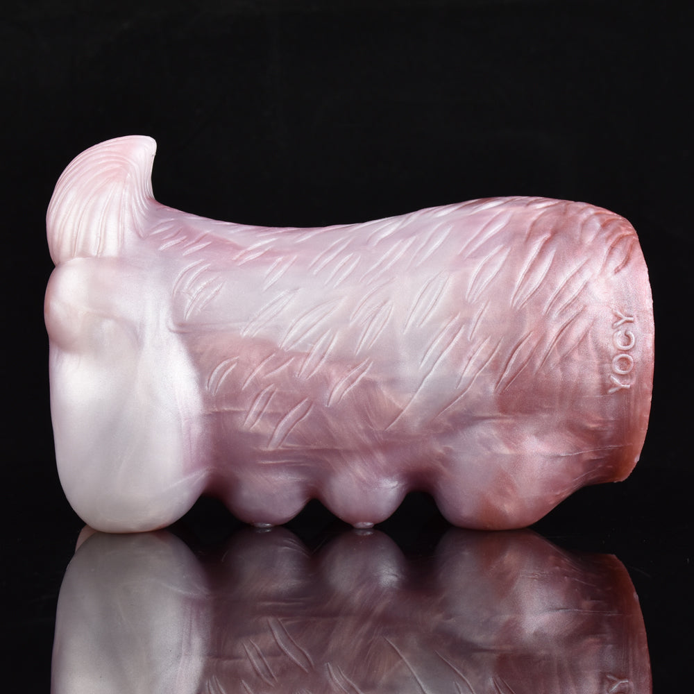 Pink canine stroker with textured body and rounded tail end