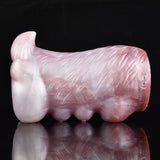 Pink canine stroker with textured body and rounded tail end