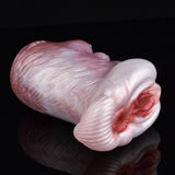 Light pink canine stroker with open two-hole end, glossy ridged surface