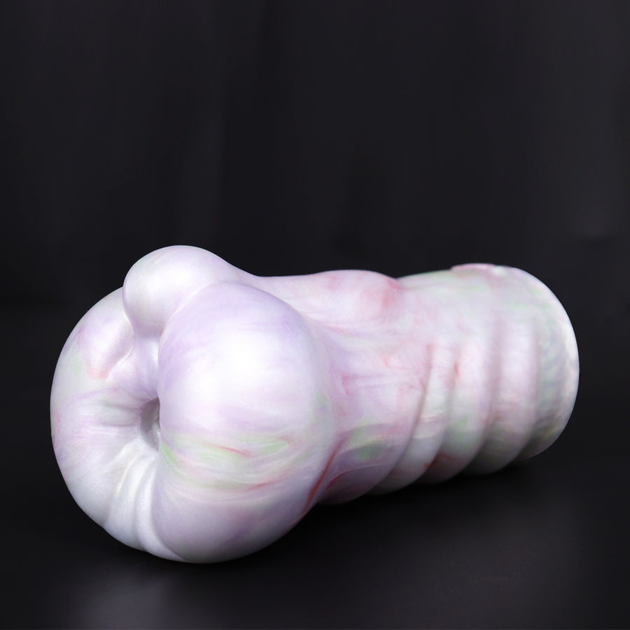 White ring-style male masturbator on red cylinder base, angled side view.