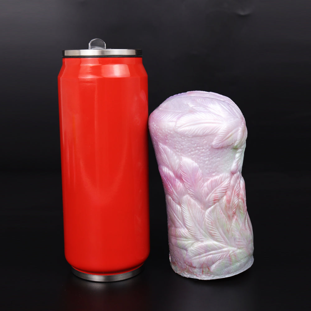 Pink pocket cup masturbator with oval opening; size markings shown