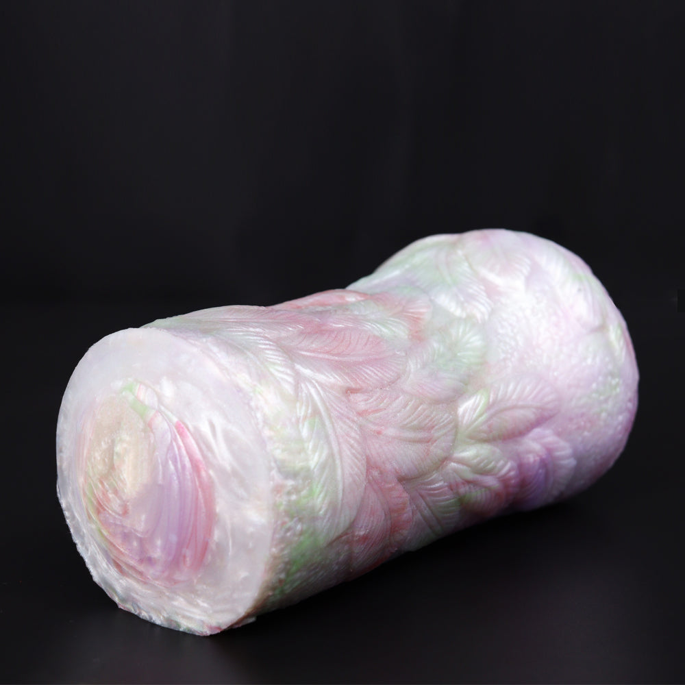 Pink textured pocket cup masturbator cylinder with molded ridges along the side