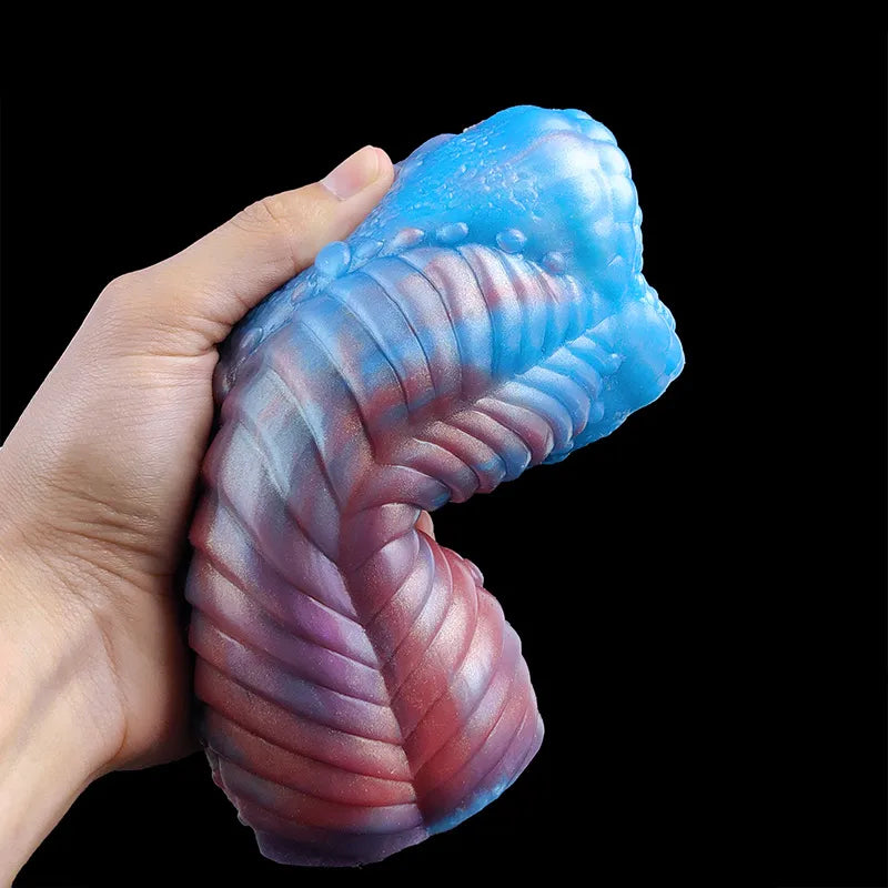 Hand-held blue-and-pink dragon male stroker, ridged grip and curved shape