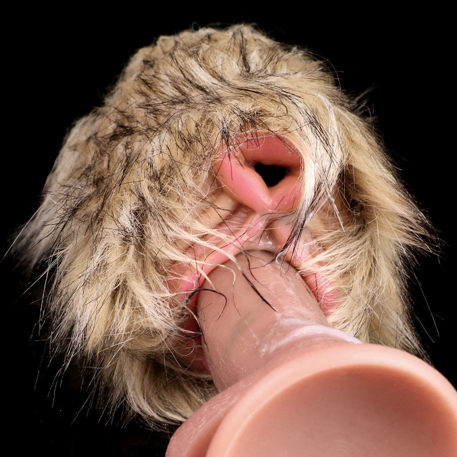 Beige faux-fur animal-shaped stroker with pink opening, close-up angle