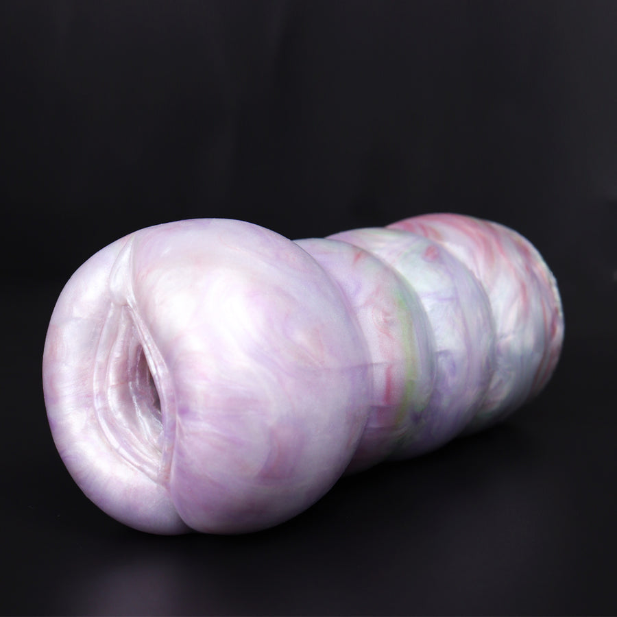 Monster masturbator, pale iridescent purple with ribbed ridges near open end