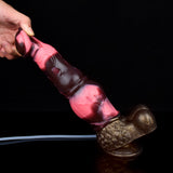 Pink-and-dark horse-head dildo with knot end, hand holding, visible base