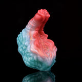 Ticus vibrating grinder toy, angled view with red top and blue marbled base